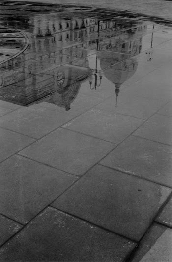 Gray Scale Photo of a Person Walking on a Street · Free Stock Photo