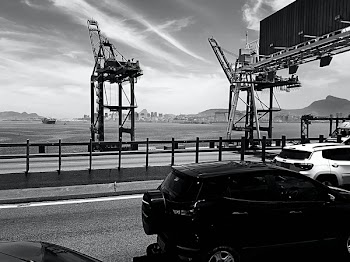 Gray Scale Photo of Black 5-door Hatchback Beside Black Sand Fields
