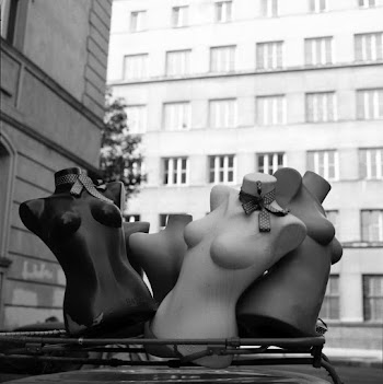 Gray scale Photo of Mannequin Torsos