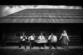 Gray scale Photo of People Playing Musical Instruments