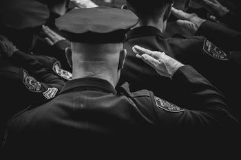 gray scale photo of soldiers