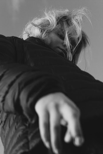 Gray scale Photo Person Wearing Black Jacket