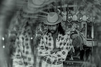 Gray scale Photography of Man Wearing a Hat and Plaid  Shirt
