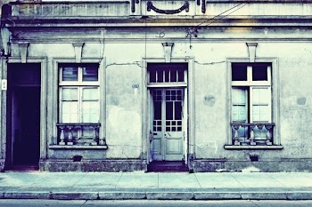 Gray Scale Photography of Opened-door on Buidling