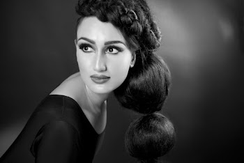 Gray scale portrait photo of a woman