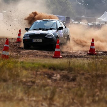 Gray Sedan on Dirt Road