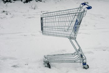 Gray Shopping Cart on Snowy Ground