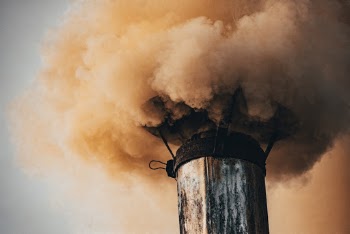 Gray Tower Covered by Smoke