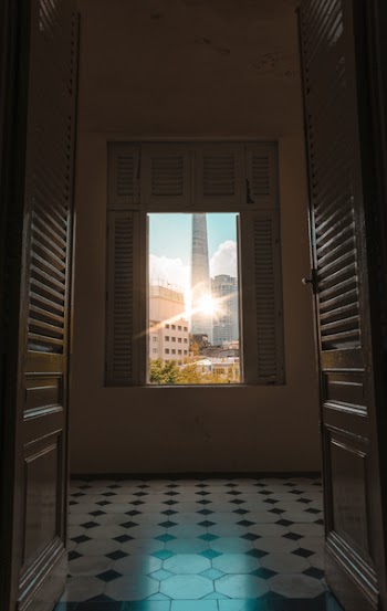 Gray Tower Through Window