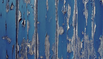 Gray Wall With Cracked Blue Paint
