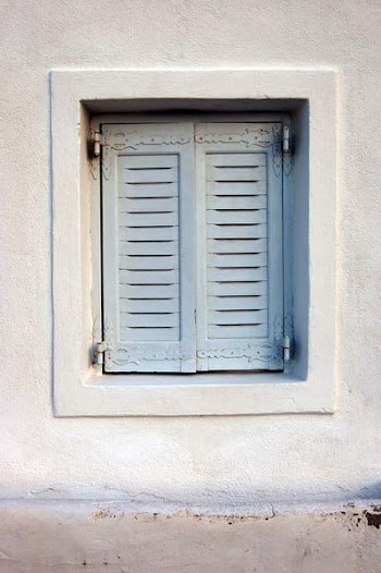 gray wooden 2-door window closed