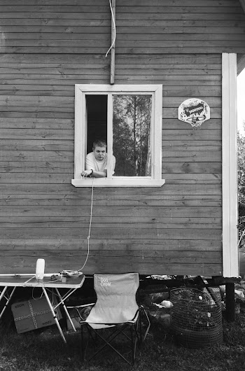 Graysacle Photography of Boy in House