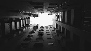 Grayscale and Worm's Eye View Photography of Building