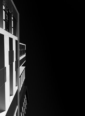 Grayscale Low Angle Photo of Building