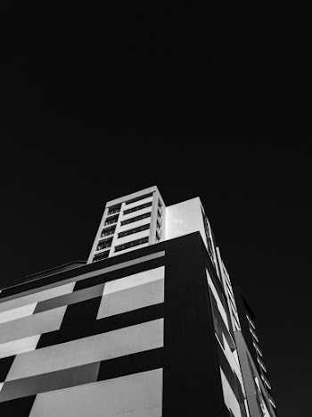 Grayscale Low Angle Photo of Building