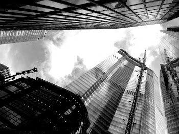 Grayscale Low-angle View of High-rise Building
