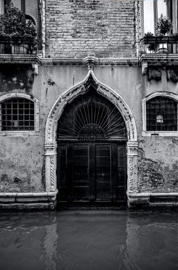 Grayscale Photo of a Black Gate · Free Stock Photo
