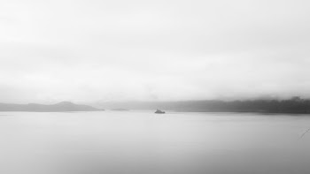 grayscale photo of a body of water