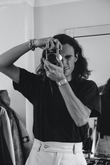 Grayscale Photo of a Man Taking Photos Using a Camera · Free Stock Photo