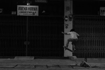 Grayscale Photo Of A Person Skating