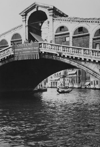 Grayscale Photo of a River Under the Concrete Bridge  · Free Stock Photo