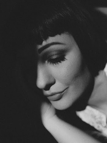 Grayscale Photo of a Woman's Face