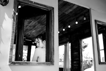 Grayscale Photo of a Woman Facing Sideways