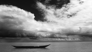 Grayscale Photo of Black Boat
