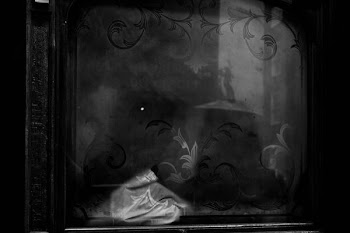 grayscale photo of black photo frame
