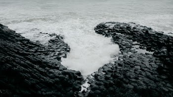 Grayscale Photo Of Body Of Water