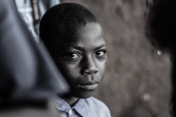 Grayscale Photo of Boy Wearing Collared Shirt