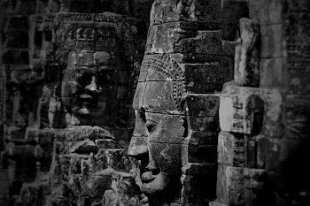 Grayscale Photo of Buddha Statues