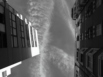 Grayscale Photo of Building's Worm's Eye View
