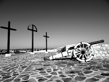 Grayscale Photo of Cannon