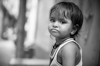 Grayscale Photo Of Child Frowning