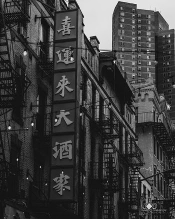 Grayscale Photo of City Buildings · Free Stock Photo