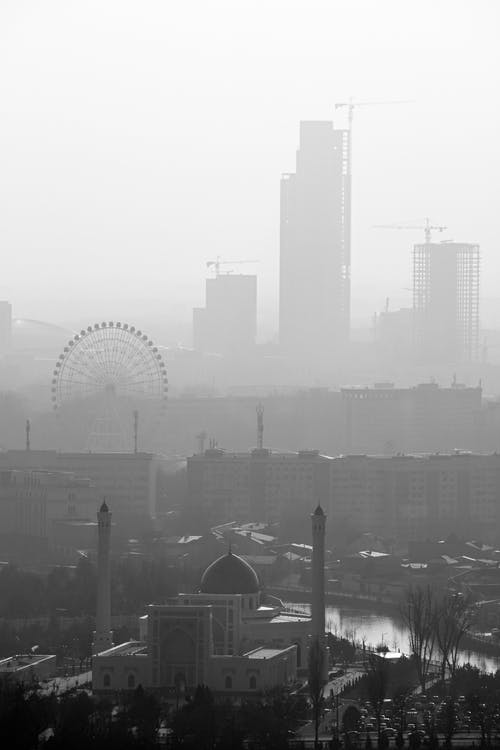 Grayscale Photo of City Skyline · Free Stock Photo