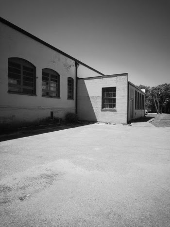 Grayscale Photo of Concrete Building · Free Stock Photo