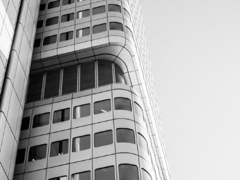 Grayscale Photo of Concrete Building · Free Stock Photo