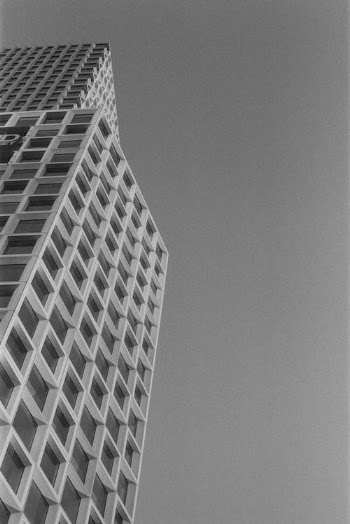 Grayscale Photo of Concrete Building · Free Stock Photo