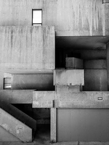 Grayscale Photo of Concrete Wall