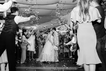 Grayscale Photo of Couple On Their Wedding Day