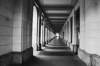 Grayscale Photo of Empty Hallway