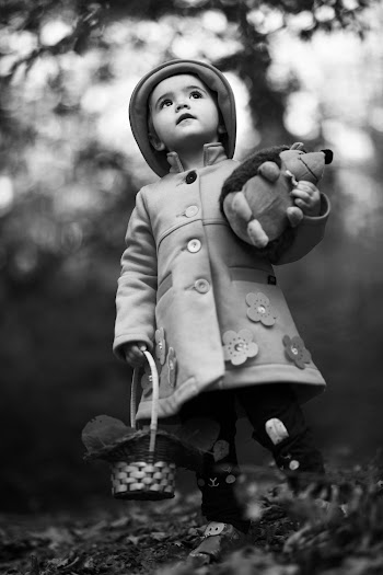 Grayscale Photo Of Girl Holding A Basket 