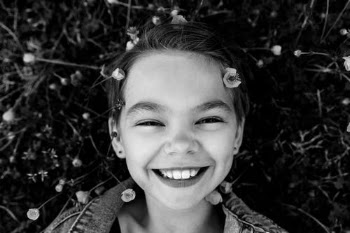 Grayscale Photo of Girl Smiling · Free Stock Photo