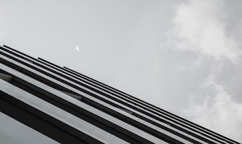 Grayscale Photo of Gray Concrete Building