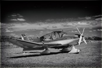 Grayscale Photo of Helicopter