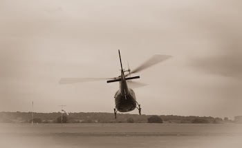 Grayscale Photo of Helicopter