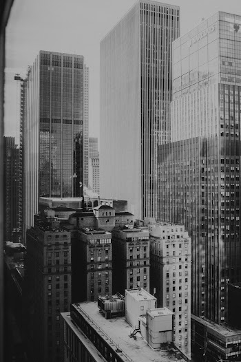Grayscale Photo of High-rise Building