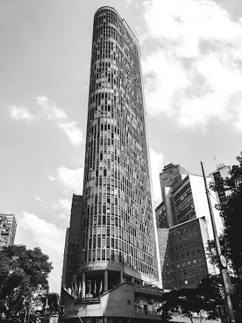 Grayscale Photo of High-rise Building